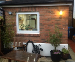 Single storey extension in Bournemouth tiles roof one window